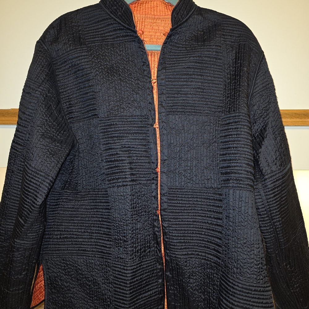 Mieko Mintz reversible quilted Kantha jacket featuring a black exterior with a p
